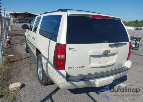 2014 Chevrolet Suburban 1500 Ltz z USA, uszkodzony, nr VIN 1GNSCKE0XER235343